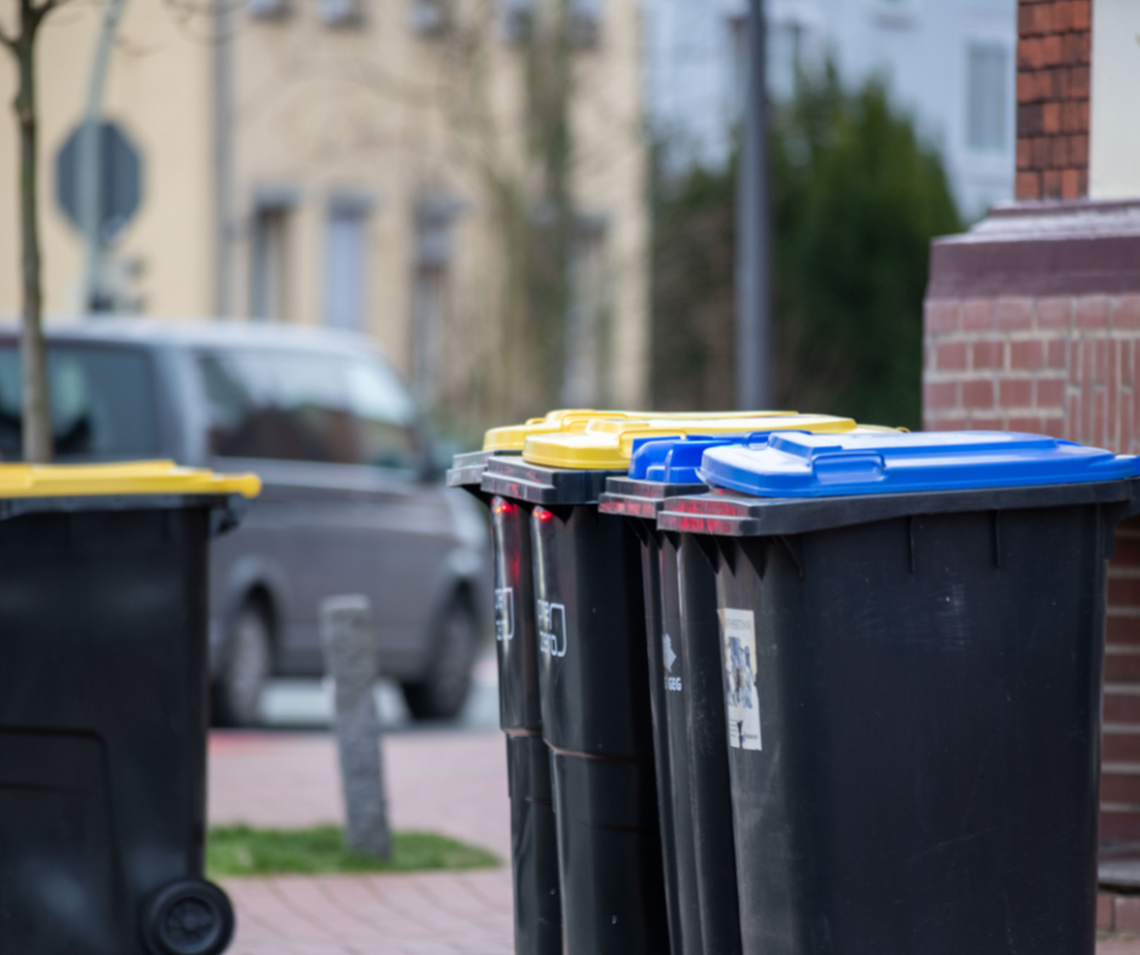 Is it illegal for my GA neighbors to put their trash in my garbage can? What state law says